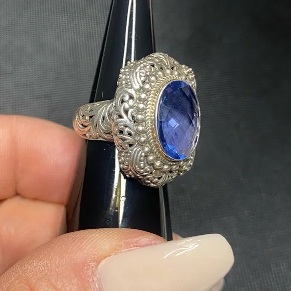 Blue Topaz and Sterling silver .925 ring. 
Size 6
Gorgeous detail. - Picture 5 of 9